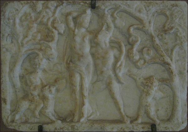 A plaque of a Bacchic scene