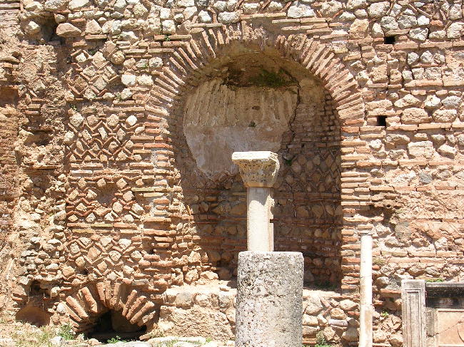 A closer view of the stalls used by merchants at Delphi. 