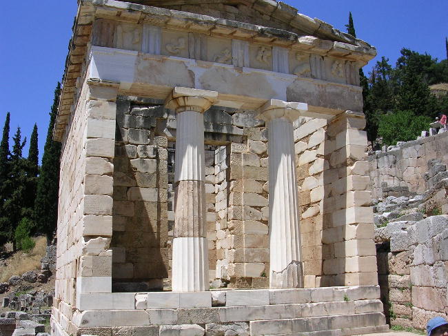 The partially reconstructed Treasury of the Athenians at Delphi.