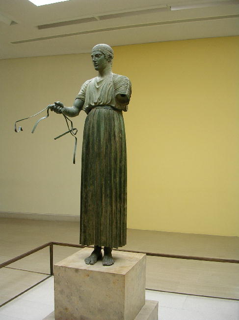 Another view of the bronze charioteer at the museum at Delphi.